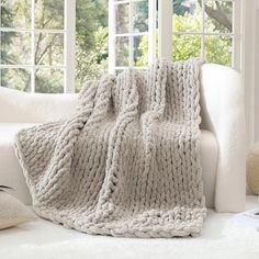 PRICES MAY VARY. Soft throw blanket: Our chunky knit blanket has the same appearance and soft touch as the chenille blanket. More importantly, this fabric drapes more luxuriously- it's lush, thick and tight! Our chunky blanket is the a great fashion-conscious choice for keeping warm in winter Multiple usage: Wrap yourself in our luxury hand knitted throw blankets while enjoying chill movies and lazy holidays. This chunky knit throw blanket is WOW just great! for relaxing at home, taking a nap, w