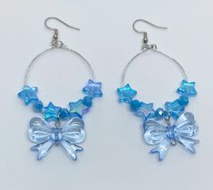 If you love adding blue accessories to your outfit or just love earrings of all kinds, then these kawaii blue earrings are a great wear! These beautifully shine in the sun as they contain blue crystals. *Stainless steel earring hooks & wire *Medium sized *Earring hooks can be switched to plastic hypoallergenic earring hooks for a fee of $1 (YOU MUST ADD THE LISTING TO YOUR CART SO I KNOW) If you have any questions, please don't hesitate to message us! We are friendly:) Blue Earrings Aesthetic, Kawaii Blue, Beaded Bow, Kawaii Earrings, Love Earrings, Kawaii Jewelry, Blue Accessories, Earrings Beaded, Bow Earrings