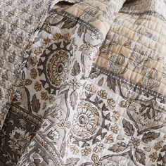 the comforter is made up with an intricate pattern on it's side and back