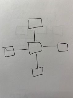 a drawing of a square and rectangles on a piece of white paper with black ink