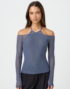 This mesh long sleeve top features off the shoulder sleeves and a halter neck styled neck line. Mesh Tops For Summer Evenings, Summer Evening Mesh Tops, Stretch Mesh Sleeve Off-shoulder Top, Stretch Off-shoulder Tops With Mesh Sleeves, Fitted Top With Cutaway Shoulders For Spring, Mesh Top For Evening In Fall, Stretch Off-shoulder Mesh Top For Spring, Long Sleeve Mesh Tops For Summer, Chic Stretch Off-shoulder Mesh Top