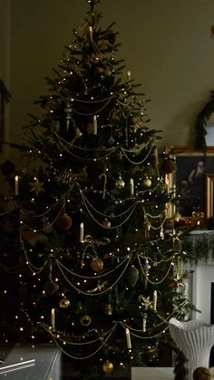 a decorated christmas tree in a living room