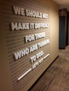 an office wall with words on it that read we should not make it difficult for those who are turning to god