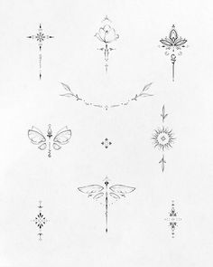 a bunch of different types of tattoos on a white paper