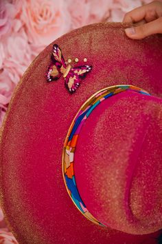 Embellished with a luxe gold chain and delicate butterfly detail, the CHAIN ME AWAY RANCHER HAT offers a unique blend of vibrancy and sophistication. Its colorful, vibrant design is sure to captivate any eye, allowing you to stand out in any crowd in a truly exquisite manner. This hat is ONE OF A KIND. To receive item quicker, expedited shipping is available at checkout. Hat Art, Delicate Butterfly, Rancher Hat, Vibrant Design, Gold Chain, Gold Chains, Chain, Hats, Gold