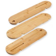 two wooden boards with holes in them on a white background