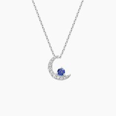 Crescent Moon Sapphire and Diamond Pendant - Silver. A sparkling sapphire rests on a crescent moon of shimmering diamonds in this stylish pendant. The length of the necklace can be adjusted to either 16 or 18 inches to suit individual preference (1/10 total carat weight). Blue Moon Diamond, Detailed Necklace, Diamond Jewelry Necklace, Wardrobe Accessories, Crescent Moon Necklace, Sapphire Pendant, Classy Jewelry, Pendant Silver, Moon Necklace