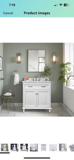 a white bathroom vanity with two sinks and mirrors