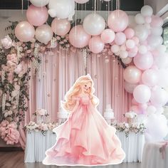 a barbie doll is standing in front of some balloons and flowers at a birthday party