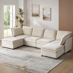 a living room with a sectional couch and rug