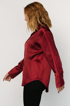 Baltic Born exclusive style Beautiful and classic blouse Lightweight Satin material Rich Burgundy color Collared neckline Faux abalone buttons Single button, rounded cuff Shirttail hemline Marianne is 5'6, cup size 34D, size 6 and wearing size S Elegant Buttoned Shirt For Fall, Elegant Shirt With Buttons For Fall, Elegant Shirt For Fall, Formal Blouse With Button Closure And Shirttail Hem, Classic Fall Blouse With Back Button Closure, Classic Blouse With Back Button Closure For Fall, Chic Shirt With Button Closure And Fold Down Collar, Chic Long Sleeve Tops With Snap Buttons, Elegant Fall Tops With Back Button Closure