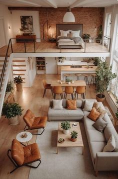 a living room filled with furniture and lots of windows