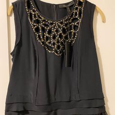 Beautiful Sleeveless Bcbg Top. Nwt, Smoke Free, Pet Free Hime. Gorgeous Top Detail And Feather Bottom. Chic Sleeveless Vest For Night Out, Chic Sleeveless Blouse For Night Out, Embellished Sleeveless Top For Evening, Sleeveless Embellished Top For Evening, Chic Sleeveless Tank Top For Evening, Black Sleeveless Embellished Tops, Embellished Sleeveless Tank Top For Evening, Black Embellished Sleeveless Tops, Chic Sleeveless Evening Tank Top