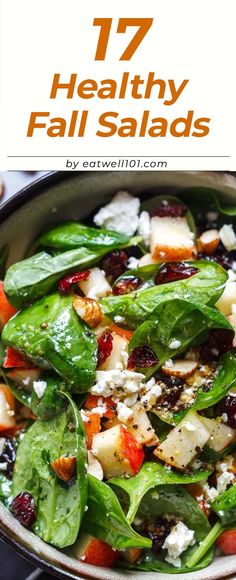 spinach salad with feta cheese and cranberries in a skillet