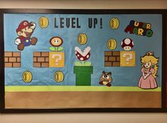 a nintendo themed bulletin board with mario and luigi on the front, which says level up