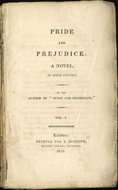 an old book with the title pride and prejudicce written in black ink