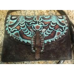 Patricia Nash Tooled Turquoise And Brown Poppy Leather Crossbody Purse. Loc:1164-15 Turquoise Hand Tooled Rectangular Shoulder Bag, Turquoise Hand Tooled Travel Bag, Hand Tooled Blue Crossbody Bag, Turquoise Hand Tooled Shoulder Bag For Travel, Turquoise Hand Tooled Bag, Blue Rectangular Hand Tooled Shoulder Bag, Hand Tooled Blue Bag For Daily Use, Blue Hand Tooled Rectangular Shoulder Bag, Hand Tooled Blue Bags For Daily Use