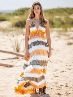 Get ready for a beach paradise with this playful Tie-Dye Maxi Dress in orange, brown and white tie-dye stripe. Embrace your quirky side with a fun and stylish look, perfect for long walks on the shore or tropical getaways. Make a statement with this unique dress and stand out in any crowd. Size Guide: Model is 5’6” tall, and has a 33.2” bust, 26.4” waist, & 35.2” hips. She is wearing a S / US 4 / AU 8. This dress is true to size. Material: 100% Polyester Feature: V-neckline. Open-back. Maxi length. Tie-Dye Prints. Lined. Care Instructions: Machine wash / Cold hand wash Sunkissed Skin, Unique Dress, Tie Dye Maxi Dresses, Tie Dye Maxi, White Dress Party, Prom Outfits, Beach Paradise, Spring Tops, Unique Dresses