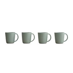 three coffee mugs sitting next to each other