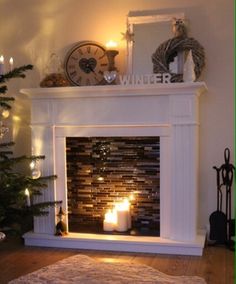 a living room with a fire place and christmas tree