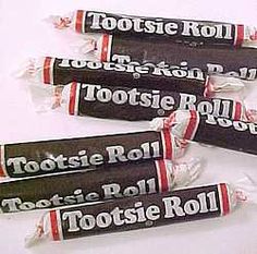 four rolls of tootsie roll sitting on top of each other