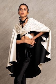 Shop for Chillosophy Beige Satin Overlap Asymmetric Batwing Cape for Women Online at Aza Fashions Jacket Cape Outfits, Modern Sewing Patterns Women, Cape Pose Reference, Cape Poses, Cape Fashion Women, Cape Runway, Capes Fashion, Cape Suit, Half Cape