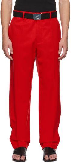 Wool delaine trousers. · Belt loops · Three-pocket styling · Zip-fly · Central crease at front and back legs · Zip vent at cuffs Supplier color: Red Red Wide Leg Pants With Side Pockets, Red Trousers With Pockets, Casual Red Dress Pants With Pockets, Red Workwear Pants With Welt Pockets, Red Work Pants With Welt Pockets, Red Trousers With Welt Pockets, Red Straight Leg Pants With Welt Pockets, Straight Leg Trousers, Apparel Accessories