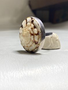 "Shell ring snail band sterling silver girls women Size 8.50 Weight 14.2g Diameter 1. 1/8\" Thinnest part of band. 1/8\" Delivered in a Gift Box Free Shipping and Free Postal Insurance If you do not want the ring polished and want to leave the natural patina please let me know at the time of purchase as I do polish rings before I ship rings out. Thanks USPS Domestic Shipping is free for buyers. If a buyer prefers to upgrade to priority, the buyer will pay that portion of the shipping charge. If Unique Silver Shell Rings, Silver Shell Rings For Gift, Poison Ring, Malachite Rings, Shell Ring, Spoon Rings, Moonstone Ring, Sterling Silver Bands, Silver Band