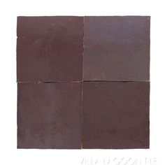 four square pieces of chocolate on a white background