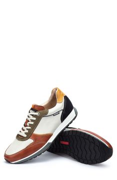 Mixed colors and textures lend visual intrigue to a sporty leather sneaker crafted for comfort. Lace-up style Removable insole Leather upper/leather and textile lining/synthetic sole Imported Leather Sneakers With Rubber Sole For Sports, Sporty Leather Sneakers With Textured Sole, Brown Sporty High-top Sneakers For Walking, Sporty Brown High-top Sneakers For Walking, Functional White Leather Walking Shoes, Modern Brown Sneakers With Ortholite Insole, Leather Sneakers With Contrast Sole For Light Sports, Leather Sneakers With Contrast Sole For Sports, Custom Leather Lace-up Sneakers With Ortholite Insole