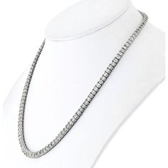 Indulge in the realm of luxury, where craftsmanship and creativity unite in our 18K White Gold 26.00 carat total weight Emerald Cut Diamond Tennis Necklace. This necklace isn't just a piece of jewelry; it's a statement of elegance and sophistication. Imagine adorning yourself with 136 graduated emerald-cut diamonds, each meticulously set to create a breathtaking visual masterpiece.Crafted with the finest 18K white gold, this necklace radiates timeless allure and impeccable artistry. The graduated design ensures a perfect contour around your neckline, enhancing your natural beauty with every wear. As you clasp it securely with the reliable box clasp and added safety feature, you'll feel a sense of assurance and style intertwined seamlessly.Whether it's a special occasion or a daily indulgen Formal Round Tennis Necklace With Box Chain, Classic Formal Tennis Necklace With Box Chain, Classic Box Chain Tennis Necklace For Formal Occasions, Formal Silver Tennis Necklace With Box Chain, Silver Tennis Necklace With Box Chain For Formal Occasions, Silver Box Chain Tennis Necklace For Formal Occasions, Silver Box Chain Tennis Necklace For Formal Events, Formal White Gold Diamond Necklace With Box Chain, Formal Diamond White Jewelry With Box Chain