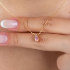 "The pink tourmaline stone represents the woman. It is a stone that symbolizes harmony and balance. Our single diamond oval pink tourmaline necklace is a jewel that you can use daily and on special occasions with its minimalist design. It is a nice gift for yourself and your loved ones. The birthstone of those born in October is pink tourmaline. 🔸🔸 Our elegant, style and stylish products suitable for special occasions and daily use are produced with love and care for you and your loved ones. ? Pink Tourmaline Necklace Gold, Pink Diamond Dainty Necklace, Dainty Pink Diamond Necklace, Pink Oval Fine Jewelry, Pink Sapphire Necklace For Gift, Fine Jewelry Pink Oval Necklace, Pink Oval Fine Jewelry Necklaces, Pink Oval Fine Jewelry Necklace, Pink Sapphire Necklaces For Wedding