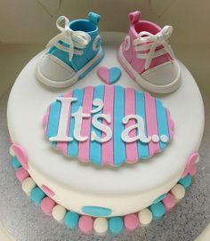 a cake that has some kind of shoe on top of it with the words tisa