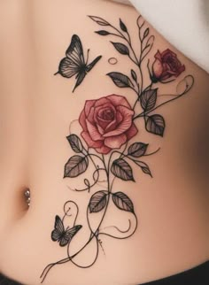 a woman's stomach with flowers and butterflies on the side, in black and red