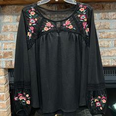 Time And Tru Women’s Embroidered Peasant Top. Black With Colorful Floral Embroidered Design On Front And Sleeves. Polka Dot Sheer Upper Back And Under All Embroidered Areas. Brand New Condition, Was Never Worn. Size Xl (16-18). Lying Flat, Pit To Pit Measures 24 1/2” Across, 28” Long. From Smoke Free And Pet Free Home. Bohemian Embroidered Long Sleeve Top With Lace Trim, Casual Black Top With Embroidered Hem, Black Peasant Top With Floral Embroidery, Black Embroidered Peasant Top, Fall Black Top With Floral Embroidery, Black Tops With Embroidered Hem For Fall, Black Peasant Blouse With Floral Embroidery, Casual Black Blouse With Floral Embroidery, Black Tops With Embroidered Sleeves For Fall