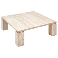 a white marble coffee table with two legs