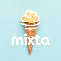 an ice cream cone with the word mixta on it's side, in front of a blue background