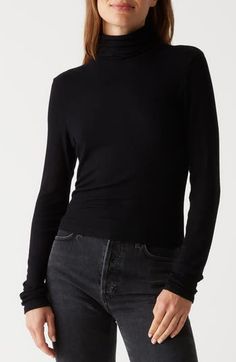 You can rely on this soft and stretchy narrow-ribbed turtleneck for classic good looks no matter what you pair it with. 24" length Turtleneck Long sleeves 97% Lenzing™ EcoVero™ viscose, 3% Lycra® spandex Lenzing EcoVero viscose is a more-sustainably produced fiber made using pulp made from renewable wood sources Machine wash, tumble dry Made in the USA Sleek Fall Tops With Minimal Stretch, Sleek Tops With Minimal Stretch For Fall, Sleek Tops For Fall With Minimal Stretch, Classic Mock Neck Top For Layering, Classic Fitted Mock Neck Top For Winter, Classic Fitted Spring Turtleneck, Fitted Versatile Mock Neck Top For Fall, Fitted Mock Neck Top For Layering In Fall, Fitted Mock Neck Top For Fall