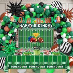 a football themed birthday party with balloons and decorations