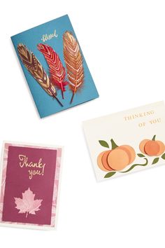 three thanksgiving cards with leaves, pumpkins and thank you written in gold on them