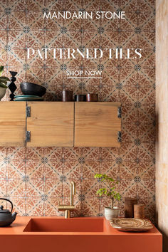 the front cover of mandarin stone's patterned tiles, featuring an orange sink and wooden cabinets