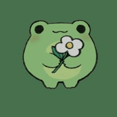 a green frog with a flower in its mouth and eyes on it's nose