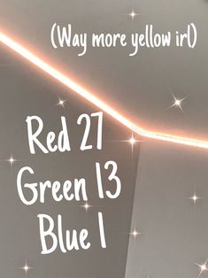 a white sign with the words red 21 green 13 blue 1 on it and stars in the background