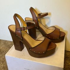 Michael Kors Platform High Heel Sandals. In Brand New Condition Only Worn Twice. Women’s Size 8.5. Brown Ankle Strap Sandals With 4-inch Heel, Brown Open Heel Wedge Sandals For Party, Brown Block Heel Wedge Sandals For Party, Brown Heel Strap Wedge Sandals For Party, Brown Wedge Sandals With Heel Strap For Party, Brown Platform Sandals Medium Width, Brown High Heel Sandals Medium Width, Brown Wedge Heel Sandals With Padded Heel, Brown Open Toe Platform Heels