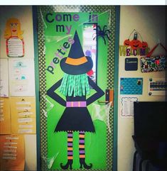 a classroom door decorated to look like a witch with her hands on her hips and legs crossed