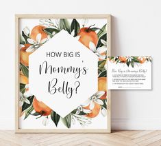 a sign that says how big is mommy's belly? with an orange and white background