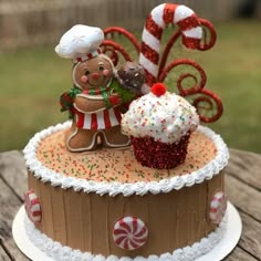 there is a cake decorated like a gingerbread man