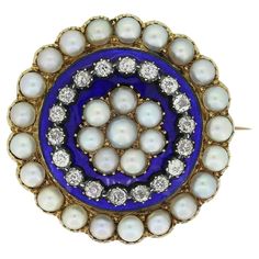 This is a Victorian 15ct gold pearl and diamond double heart brooch. The brooch features a rose cut diamond double heart motif crafted in silver within a blue and white enamel centre section. Surrounding the outside of the brooch are twenty eight natural pearls. The brooch has been crafted in gold and silver with a secure c clasp in the back for added safety when worn. Condition: Used (Very Good) Weight: 6.3 grams Dimensions: 18mm x 30mm x 10mm Pearls: 28 (2.5mm) Period: Victorian Tested As: 15ct Gold and Silver Box: Vintage Box (as advertised) Round Rose Cut Diamond Brooch For Anniversary, Anniversary Round Brooch With Rose Cut Diamonds, Round Anniversary Brooches With Rose Cut Diamonds, Anniversary Round Brooches With Rose Cut Diamonds, Heart Motif, Heart Brooch, Diamond Brooch, Enamel Brooch, Silver Box