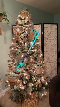 a star wars themed christmas tree with lights