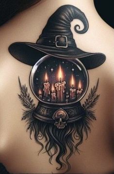 the back of a woman's neck with candles and witches hat on it